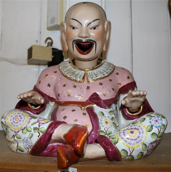 A Chinese porcelain pagoda nodding boy, 13in.